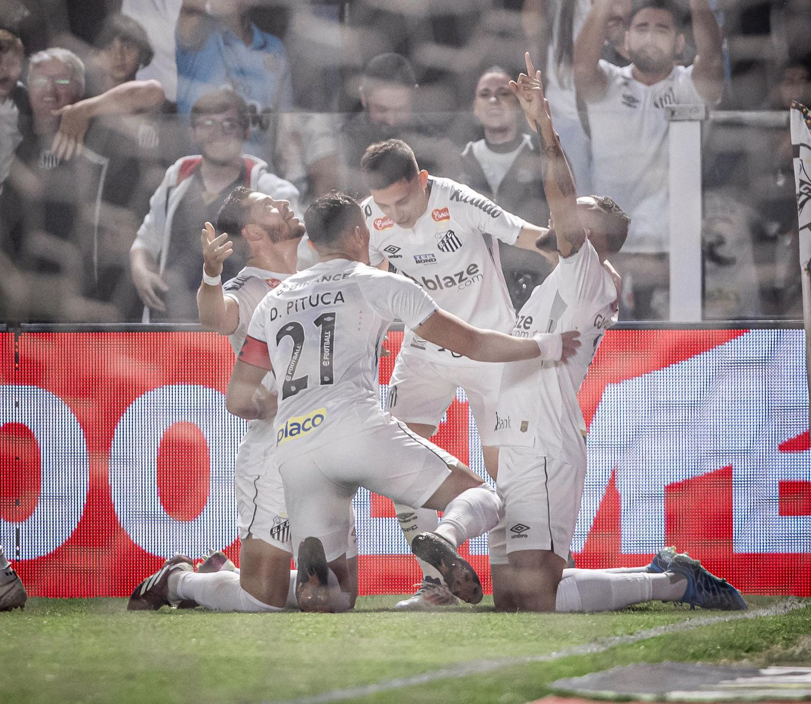 Santos players celebrating a goal